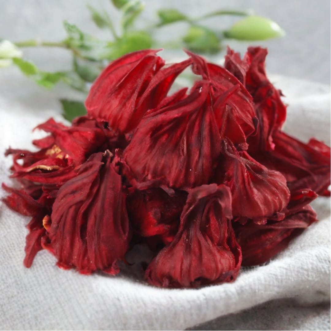 Roselle Flower Tea 1 Roselle (hibiscus) flower tea — deep crimson infusion, dried calyces